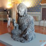 A sculptor has an exhibit with Buddha sitting across from Jesus in current Palazzo Vecchio art exhibit